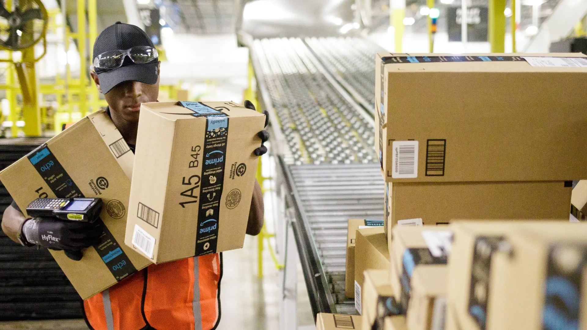 Associate carrying packages